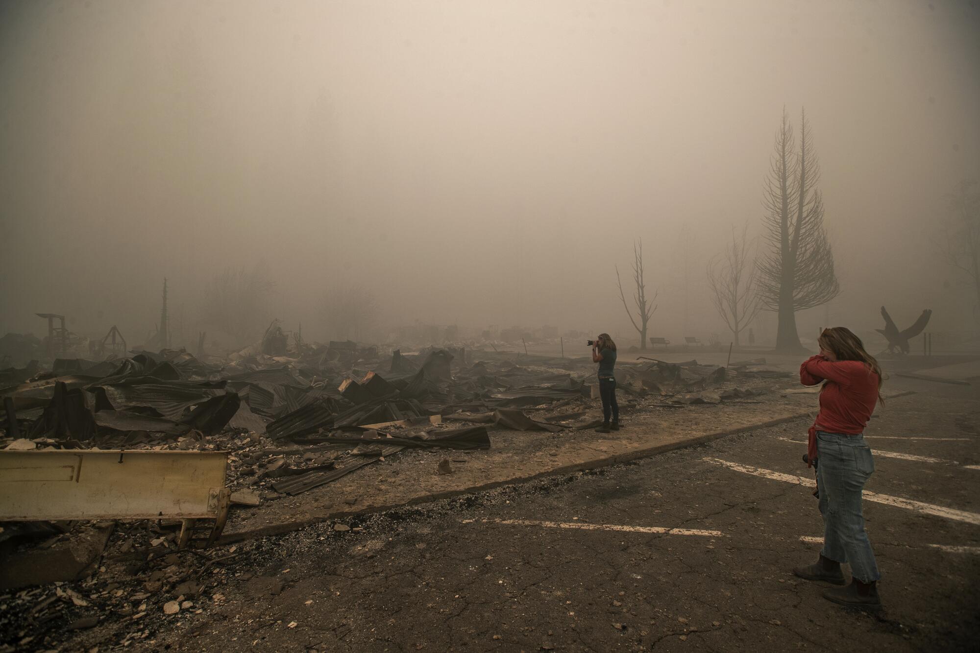 People on Main St. in Greenville destroyed in the Dixie Fire.