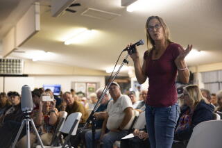 Misha Melehes speaks during a hearing held by the Arizona Department of Water Resources in Brenda, Ariz.