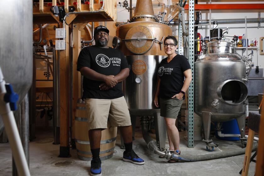 OCEANSIDE, CA - AUGUST 8: Sean Hallman, a navy vet, and wife Lisa Ireland have been making 1893 Navy Strength Rum, named in honor of the year the Navy Chief Petty Officer Rank was established, at their distillery Shadow Ridge Spirit Company, shown here on Sunday, August 8, 2021 in Oceanside, CA. (K.C. Alfred / The San Diego Union-Tribune)