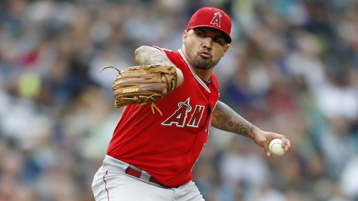 Angels starter Hector Santiago delivers a pitch during a win over the Seattle Mariners on Friday.