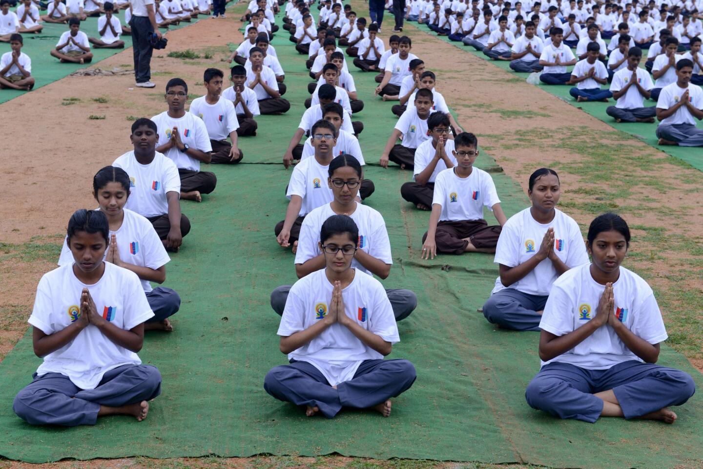 National Cadet Corps members perform yoga to mark International Yoga Day at the parade grounds in Secunderabad, India.