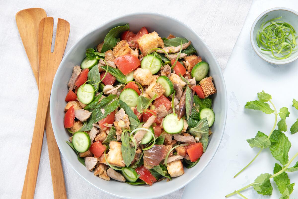 Tomato basil salad recipe with roast duck, croutons, and scallions ...