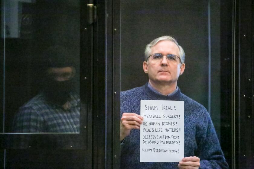 FILE - Paul Whelan, a former U.S. Marine who was arrested for alleged spying, listens to the verdict in a courtroom at the Moscow City Court in Moscow, Russia, June 15, 2020. (Sofia Sandurskaya, Moscow News Agency photo via AP)