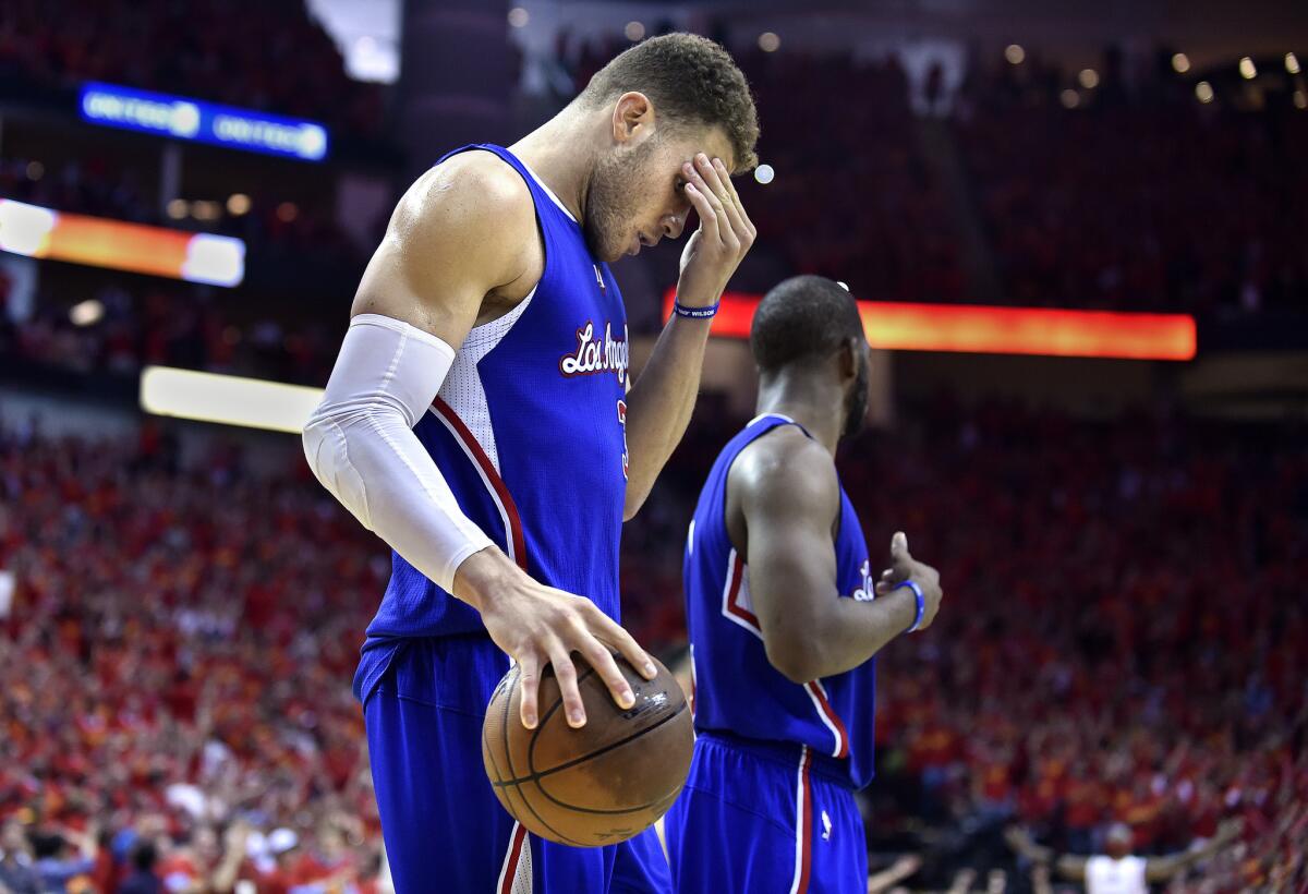 Clippers forward Blake Griffin reacts after Rockets forward Trevor Ariza (not pictured) made a three-pointer late in the fourth quarter of Game 7.