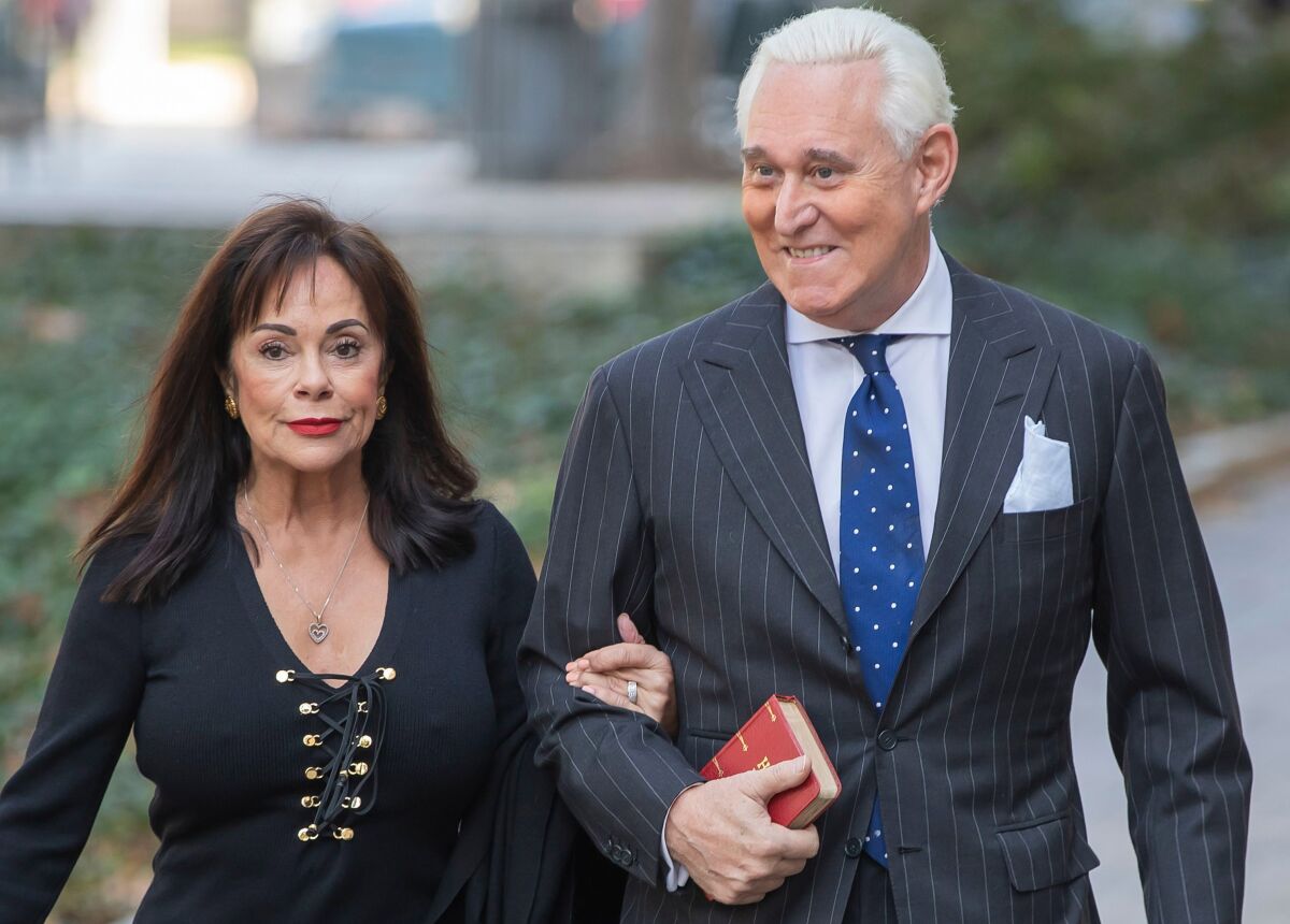 Roger Stone with his wife, Nydia, at a federal courthouse in November 2019, a day after his conviction on seven counts. 