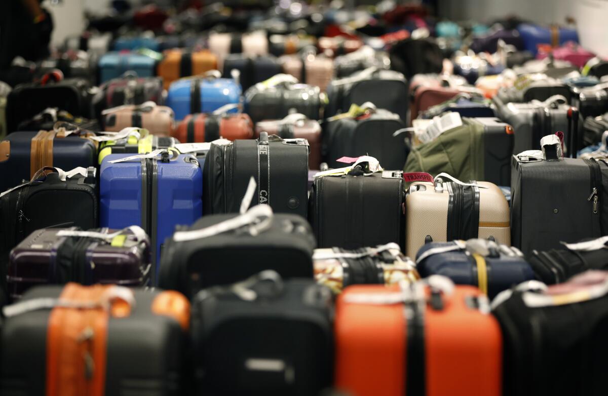 Rows of luggage wait for their owners in the Southwest Airlines baggage claim at LAX.
