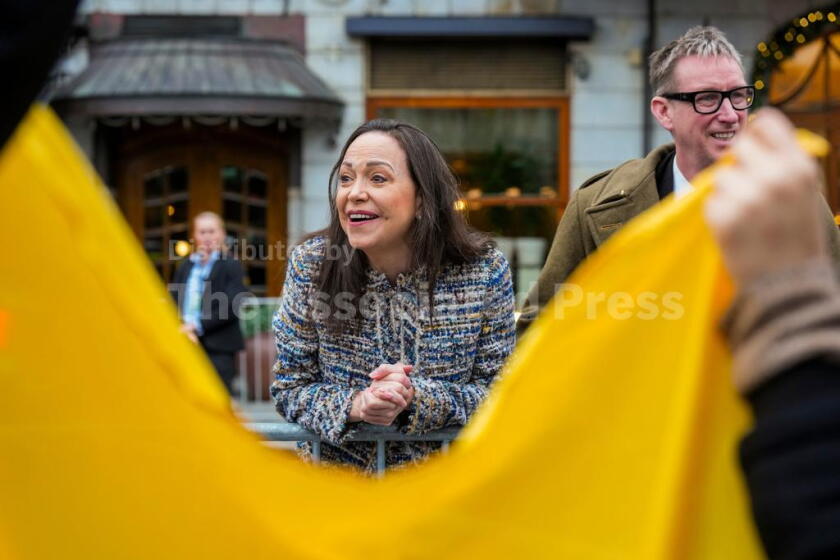 Nobel Peace Prize winner María Corina Machado with Deputy Leader of the Norwegian Nobel Committee Asle Toje, right, outside the Grand Hotel in Oslo, Friday Dec. 12, 2025. (Ole Berg-Rusten/NTB via AP)