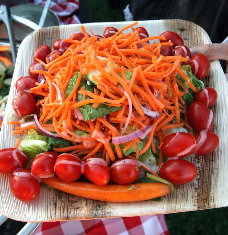 The dinner salad for Rose Hogg, of Hogg's Hollow Preschool, at Olberz Park in La Cañada Flintridge at the annual La Cañada Flintridge Chamber of Commerce mixer on Thursday, September 17, 2015. The theme is the Wizard of Oz.