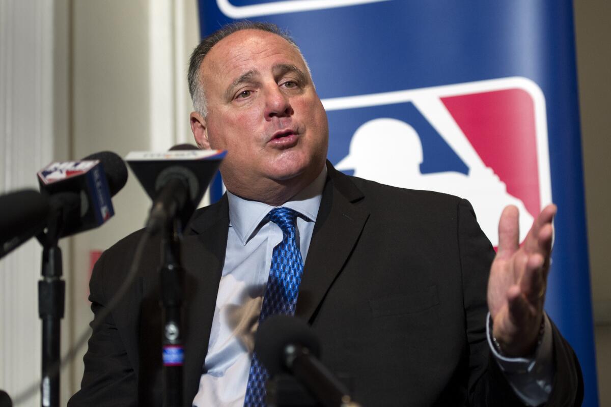 Angels Manager Mike Scioscia talks to reporters Dec. 7 during Major League Baseball's winter meetings in Oxon Hill, Md.