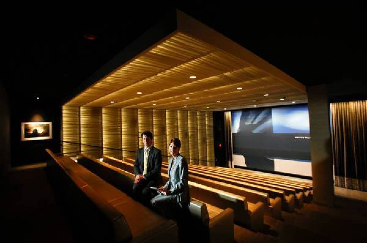 United Talent Agency has held 275 screenings at its private theater since the company’s new Beverly Hills headquarters opened in September. Above, David Lapeze, UTA's chief technology officer, and Lisa Perrine, CEO of audio-visual consultant Cibola Systems, inside the screening room in April.