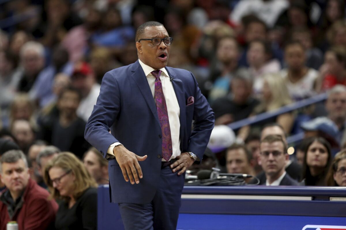 FILE - In this March 20, 2020 file photo, New Orleans Pelicans coach Alvin Gentry watches during the first half of the team's NBA basketball game against the Miami Heat in New Orleans. The Pelicans have fired Gentry, Saturday, Aug. 15, after the club missed the playoffs for the fourth time in five seasons. (AP Photo/Rusty Costanza, File)