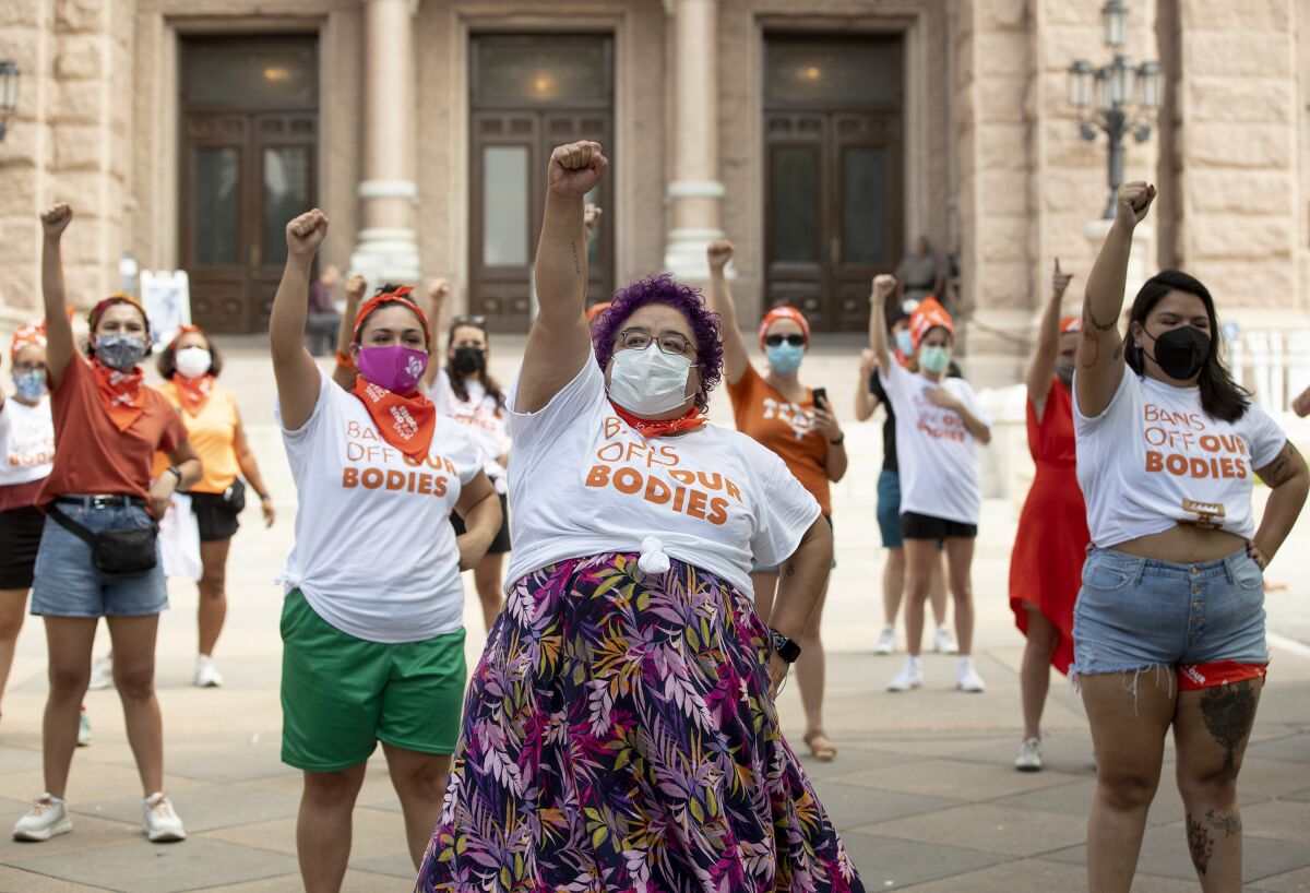 FILE - In this Wednesday, Sept. 1, 2021 file photo, Barbie H. leads a protest against the six-week abortion ban at the Capitol in Austin, Texas. Dozens of people protested the abortion restriction law that went into effect Wednesday. (Jay Janner/Austin American-Statesman via AP, File)