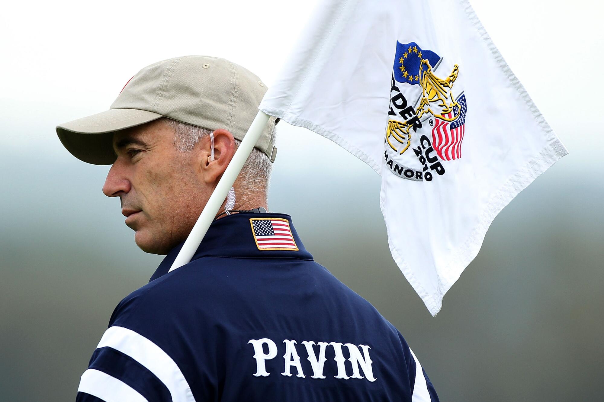 The Rider Cup captain in the United States holds a Korean Korean Pavin, the flag stick during a 2010 training tour at Celtic Manor Resort.