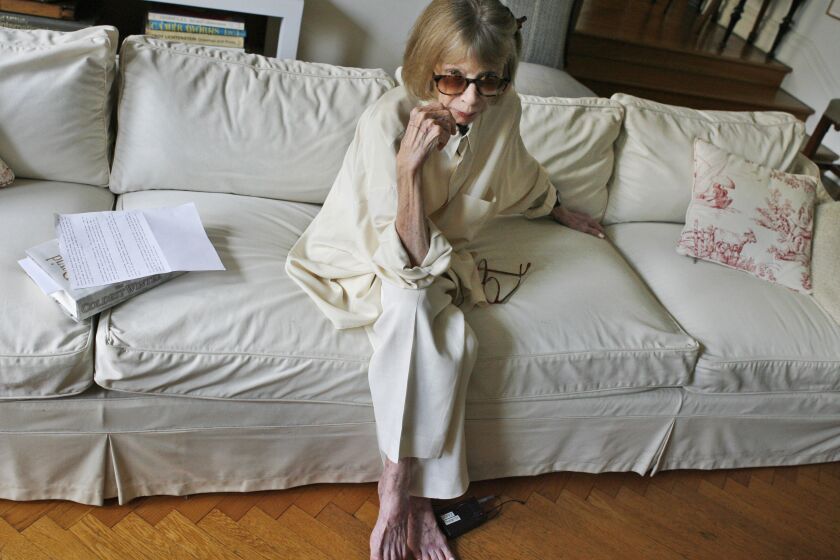 Author Joan Didion poses for a photograph in her New York apartment, Thursday, Sept. 27, 2007, before being interviewed for a short promotional film for David Halberstam's "The Coldest Winter," the final book by the Pulitzer Prize-winning journalist who was killed last spring in a California car accident. (AP Photo/Kathy Willens)