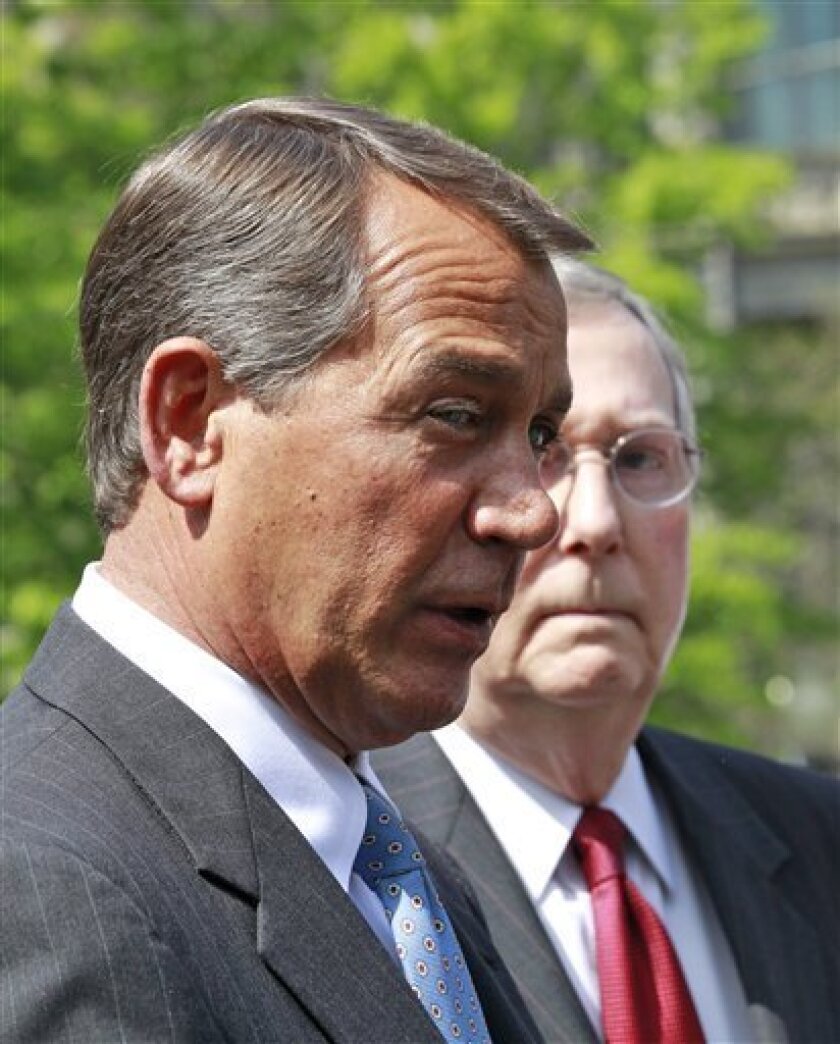 FILE - In this April 14, 2010 file photo, House Minority Leader John Boehner of Ohio, left, and Senate Minority Leader Mitch McConnell of Ky., talk to reporters outside the White House in Washington. Boehner could walk down most U.S. streets anonymously. But the perpetually tanned golf lover, who grew up in a Cincinnati family of 14, could become the next House speaker and the GOP leader of opposition to President Barack Obama. (AP Photo/Alex Brandon, File)