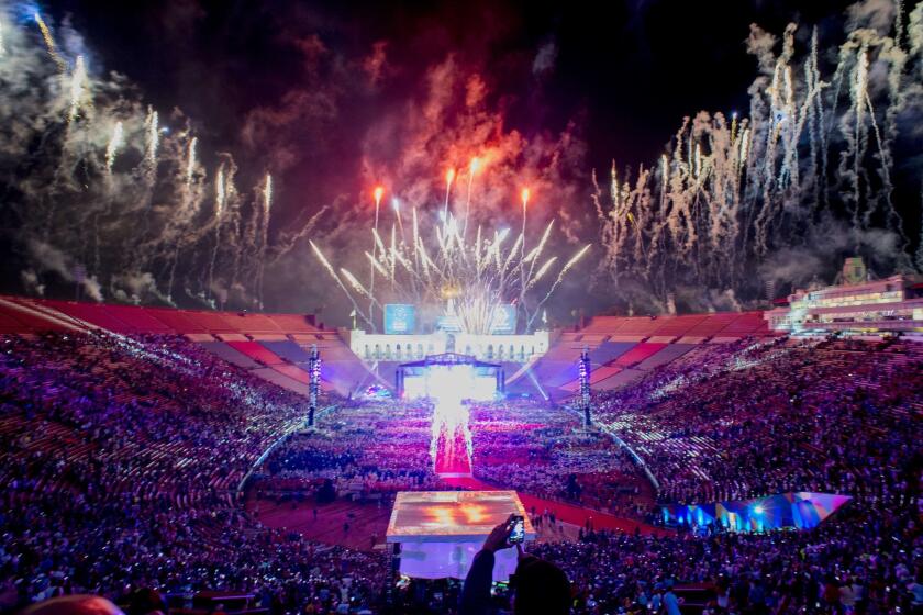 Fireworks explode over the Los Angeles Memorial Coliseum during the 2015 Special Olympics World Games Opening Ceremony, July 25, 2015 in Los Angeles, California. The Special Olympics, the world's largest sports organization for children and adults with intellectual disabilities, will be the single largest event in Los Angeles since the 1984 Olympics, with more that 7,000 athletes from 165 countries participating. AFP PHOTO / Robyn BeckROBYN BECK/AFP/Getty Images ** OUTS - ELSENT, FPG - OUTS * NM, PH, VA if sourced by CT, LA or MoD **