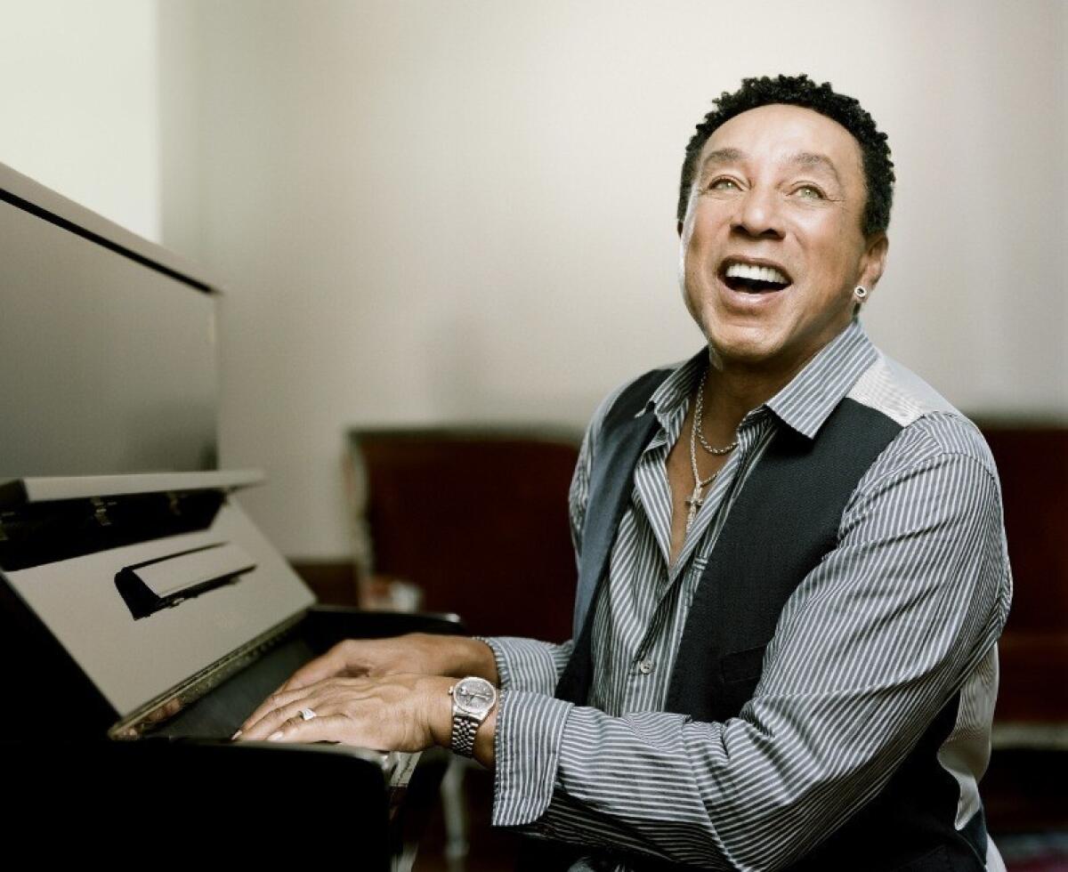 Smokey Robinson accompanies himself on the piano as he sings. 