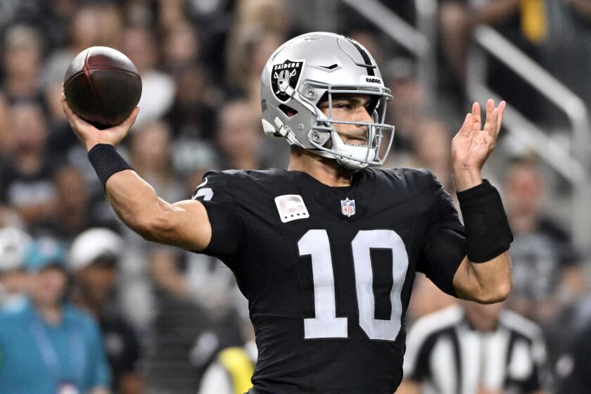 Las Vegas Raiders quarterback Jimmy Garoppolo throws during the first half of an NFL football game against the Pittsburgh Steelers Sunday, Sept. 24, 2023, in Las Vegas. (AP Photo/David Becker)