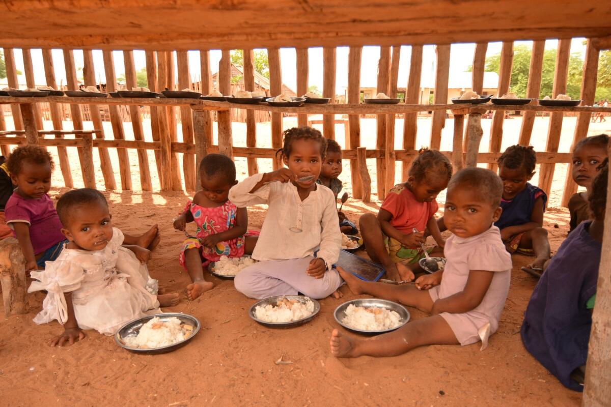 During Madagascar's worst drought in 35 years, parents spend what little they have on food and water, leaving no money for school costs. World Food Program school meals keep children in class and address malnutrition.