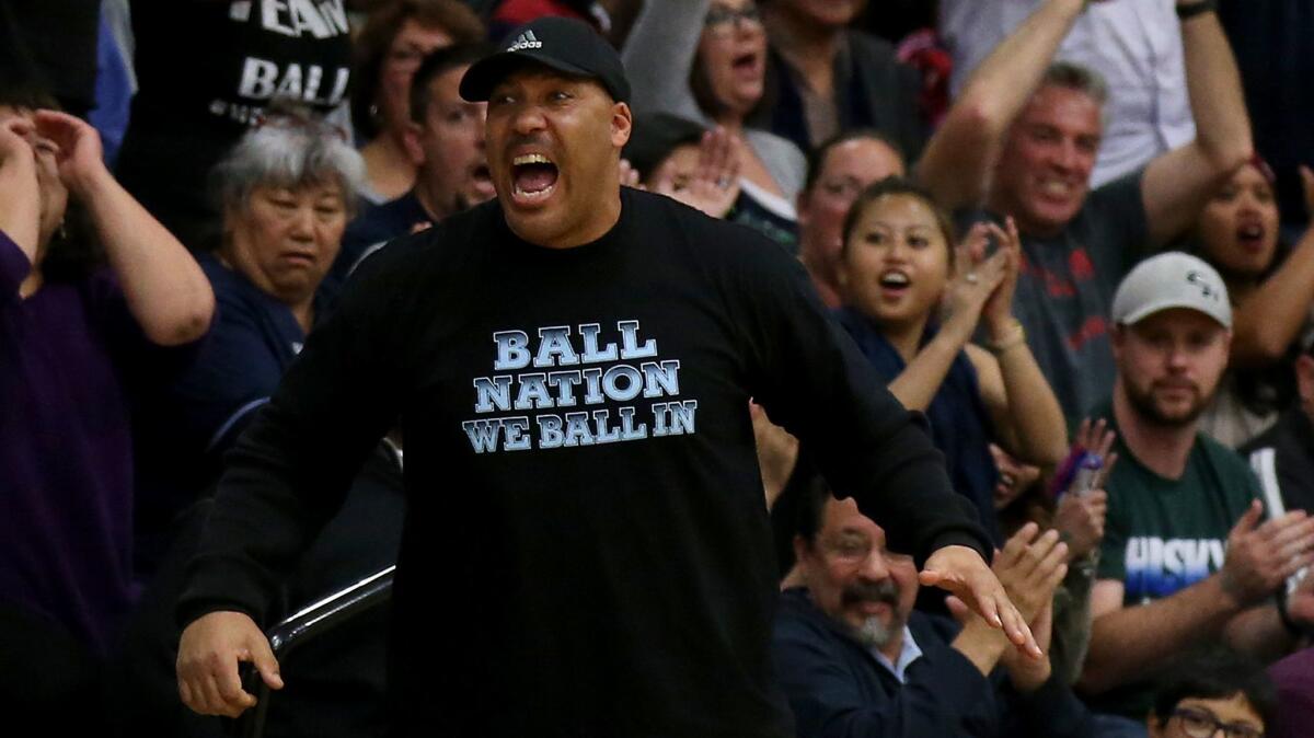 LaVar Ball cheers during a Chino Hills basketball game on March 12, 2016.