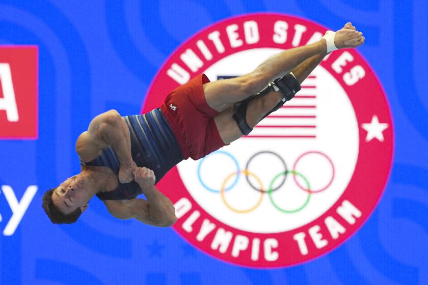 Brody Malone competes in the floor exercise at the United States Gymnastics Olympic Trials.