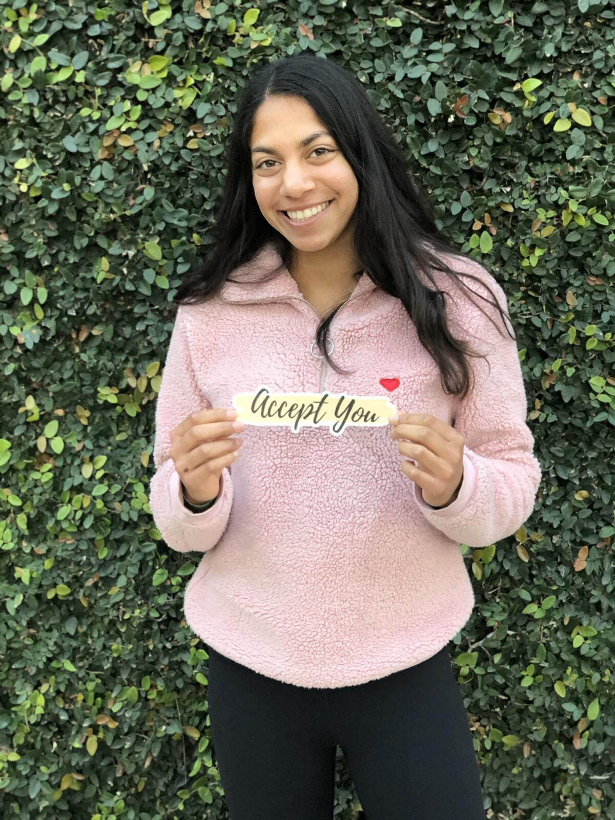 CCA sophomore Karina Parikh created a line of stickers with positive messages for teens.
