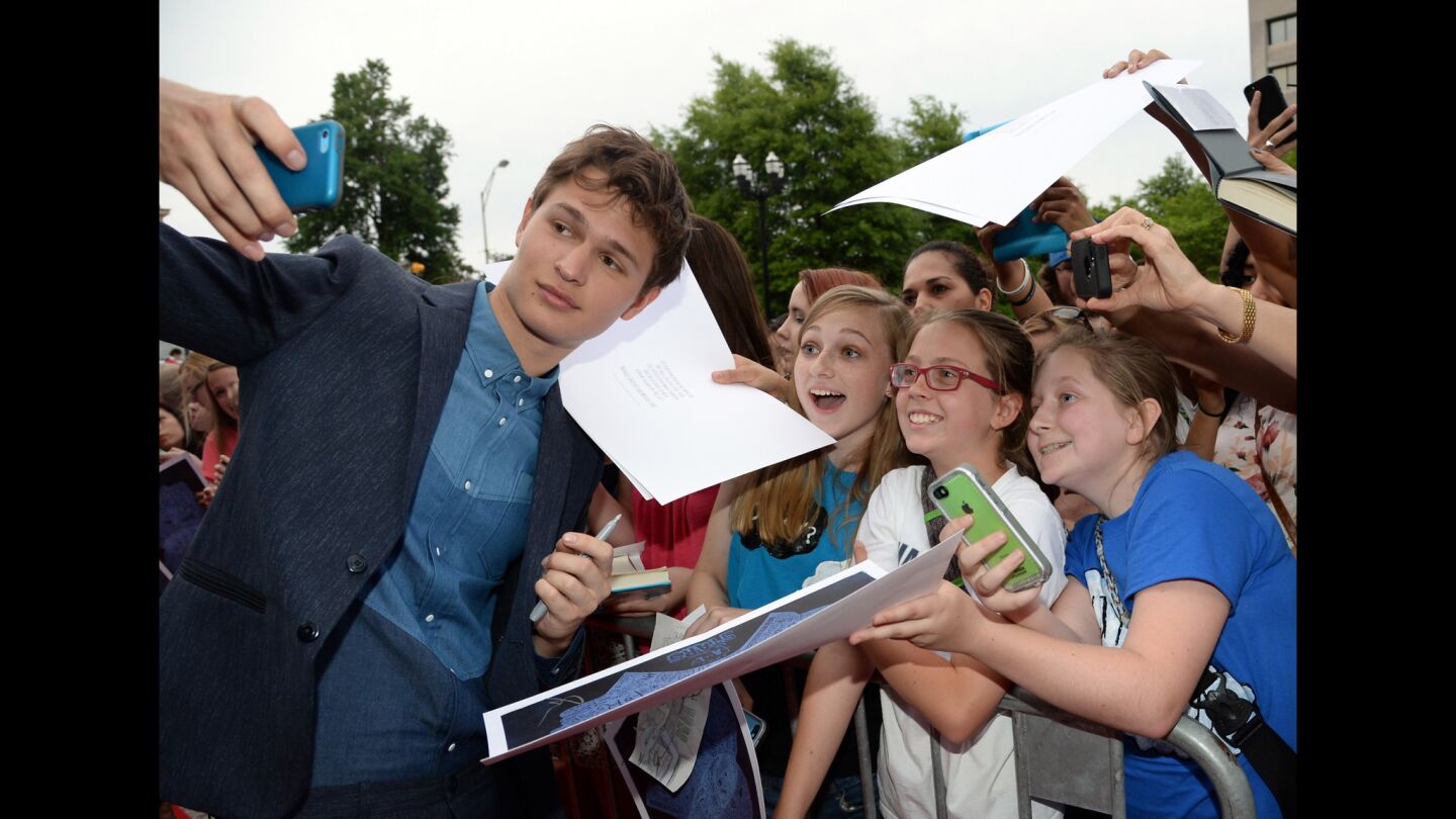 Ansel Elgort snaps a thrill at a red carpet and fan event for the new film "The Fault in Our Stars" in Nashville on May 8.