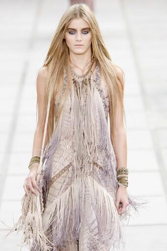 Dangling fringe and animal prints add up to a 1970s rock goddess vision at Roberto Cavalli.