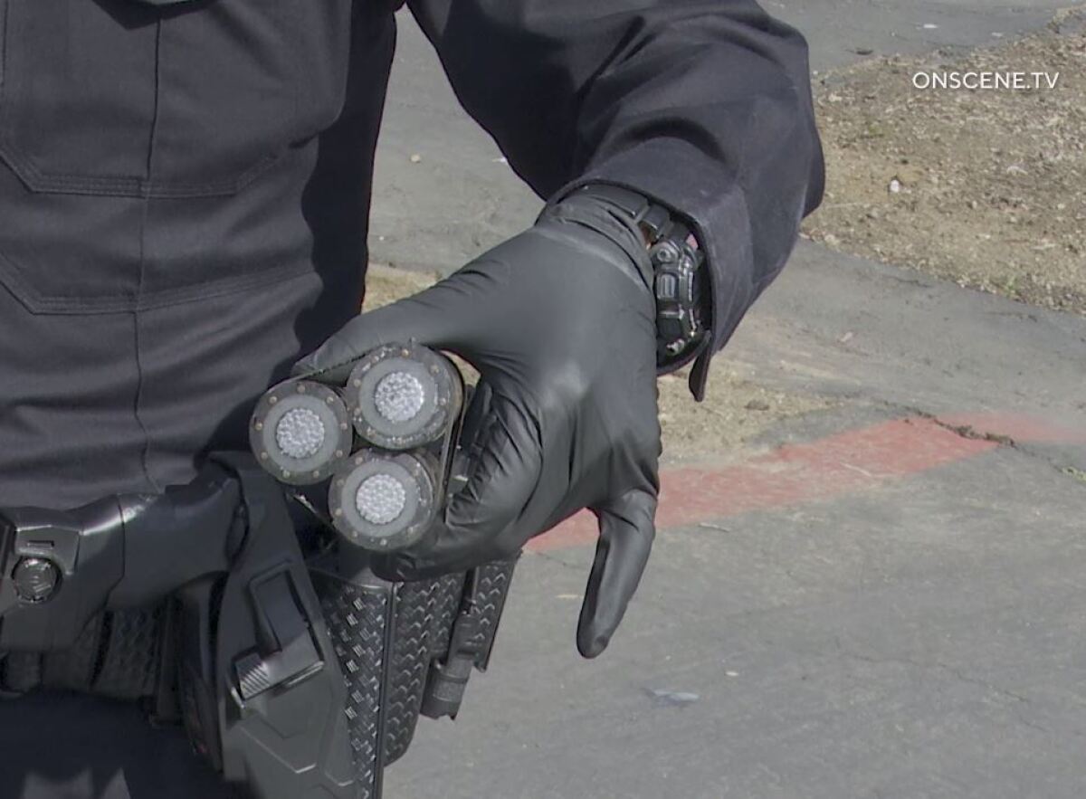A National City police officer displays the item that prompted a bomb scare Monday morning.