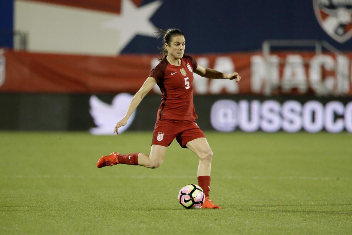 U.S. defender Kelley O'Hara makes a pass during an international friendly 