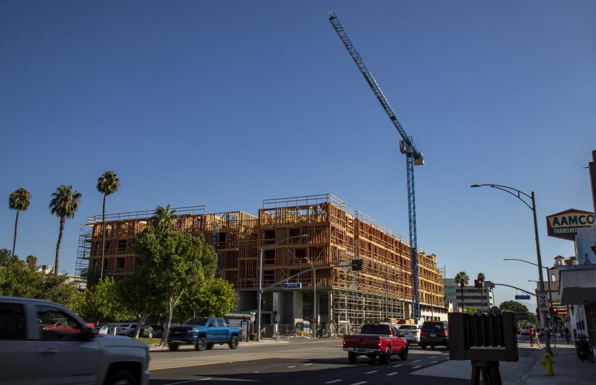 Construction is underway for a 22,000-square-foot retail space with 165 housing units in downtown Riverside.