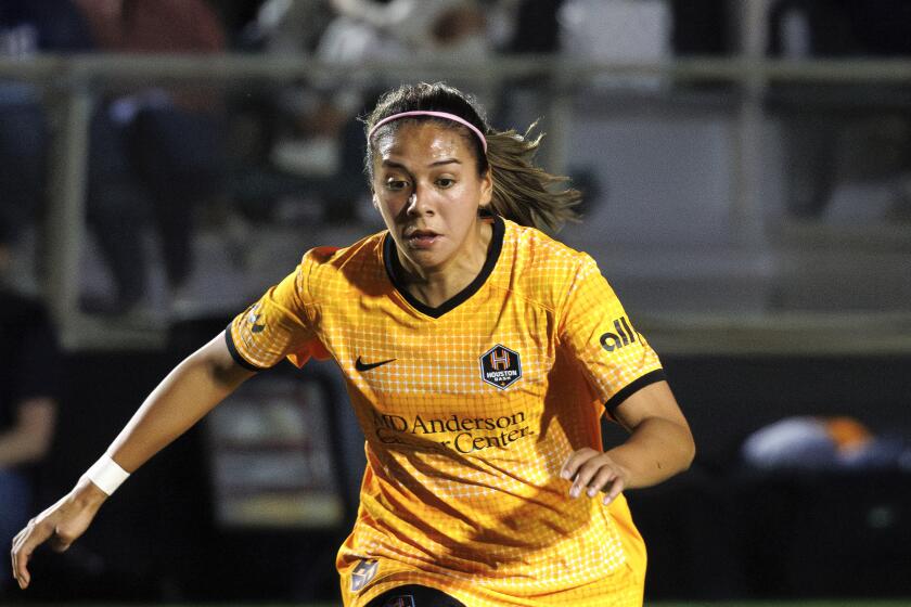 Houston Dash's María Sánchez (7) handles the ball during an NWSL soccer match, Saturday, March 16, 2024, in Cary, N.C. (AP Photo/Ben McKeown)