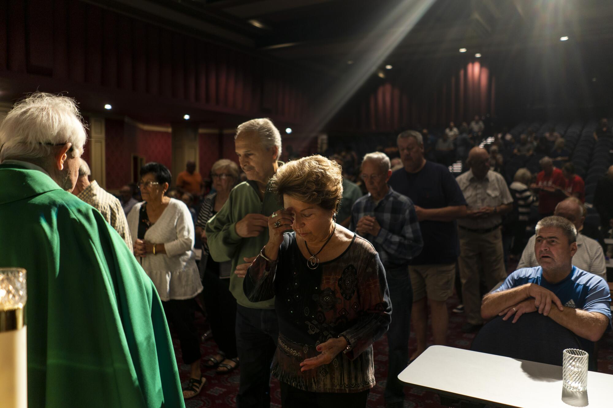 Father Charlie Urnick celebrates Mass 