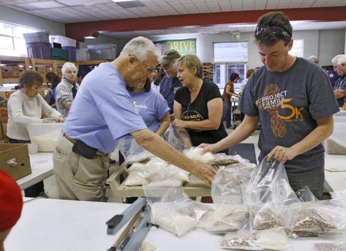 About 50 volunteers bagged 2,000 pounds of beans and rice in one-pound bags at Salvation Army Glendale on Saturday.Volunteers from the Salvation Army, Glendale Kiwanis and Glendale College Circle K lent a hand to bag food that will go out to about 1,000 families.