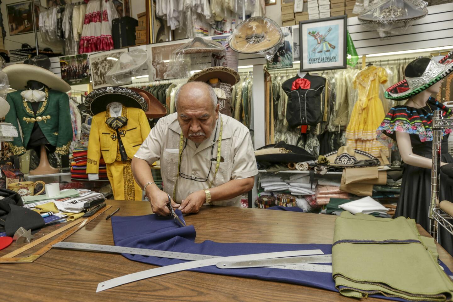 Jorge Tello, 62, said last night he was happy, thinking that Hillary Clinton would win the presidency. This morning, he woke up sad, worried about how a Donald Trump presidency would affect immigrants like him. Tello has owned a mariachi uniform tailoring shop in Boyle Heights for the last 30 years.