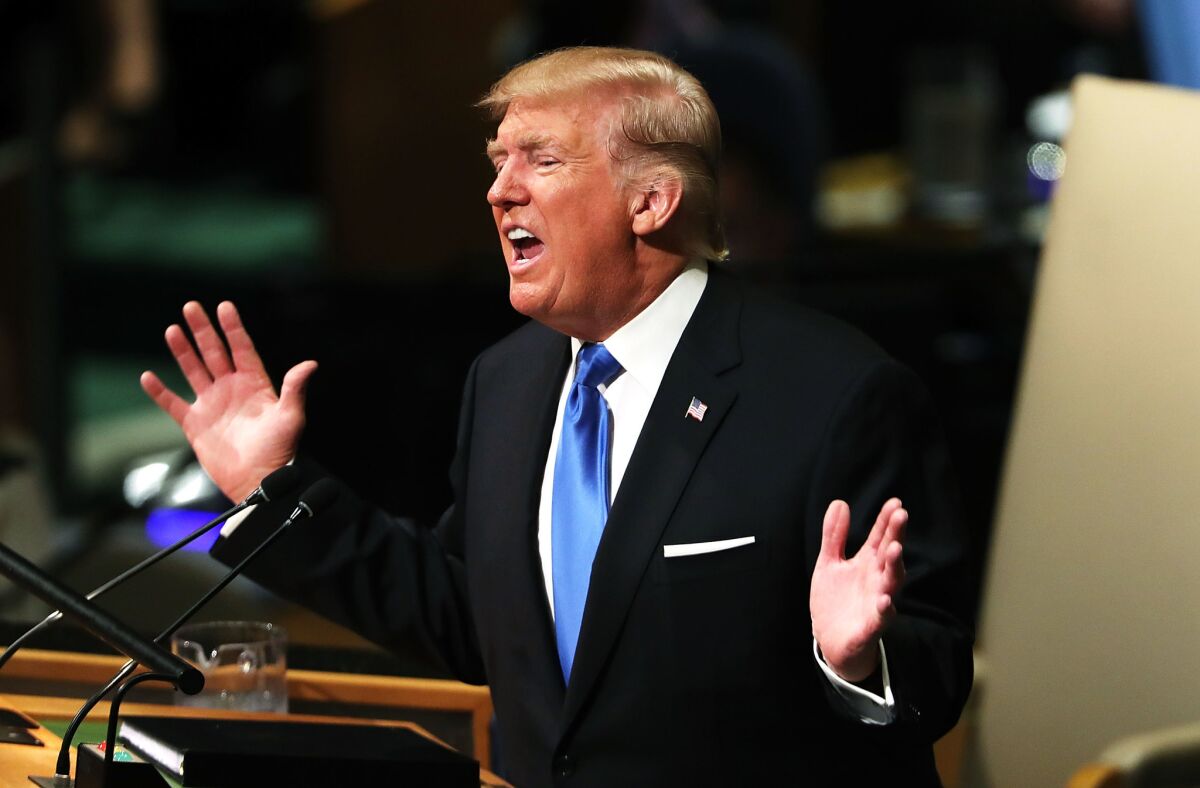 President Trump speaks Monday at United Nations General Assembly, where he accused migrant rights advocates of pushing "cruel and evil" policies.