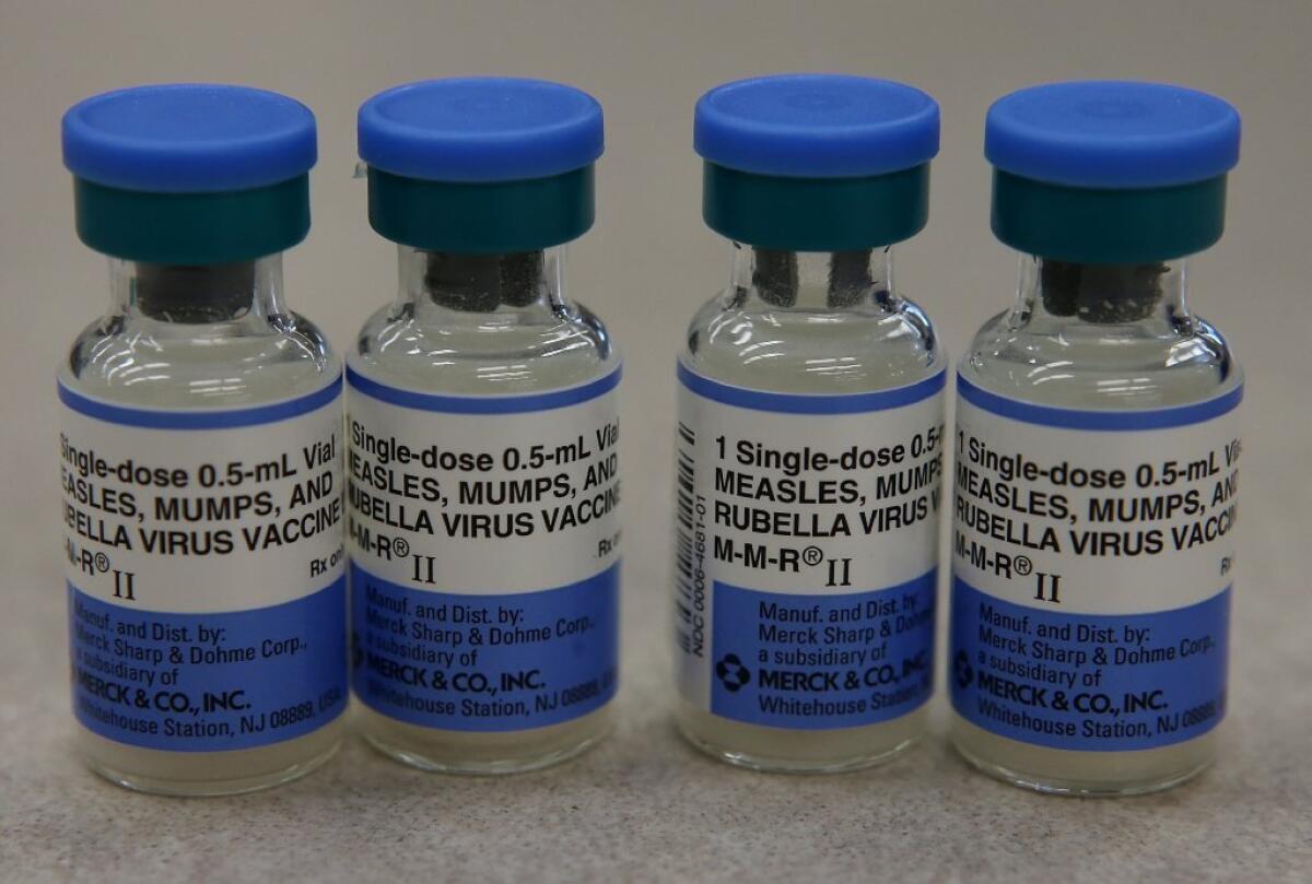 Vials of the measles, mumps and rubella vaccine are displayed at a Walgreens in Mill Valley. An outbreak of measles in California has sickened dozens of people.