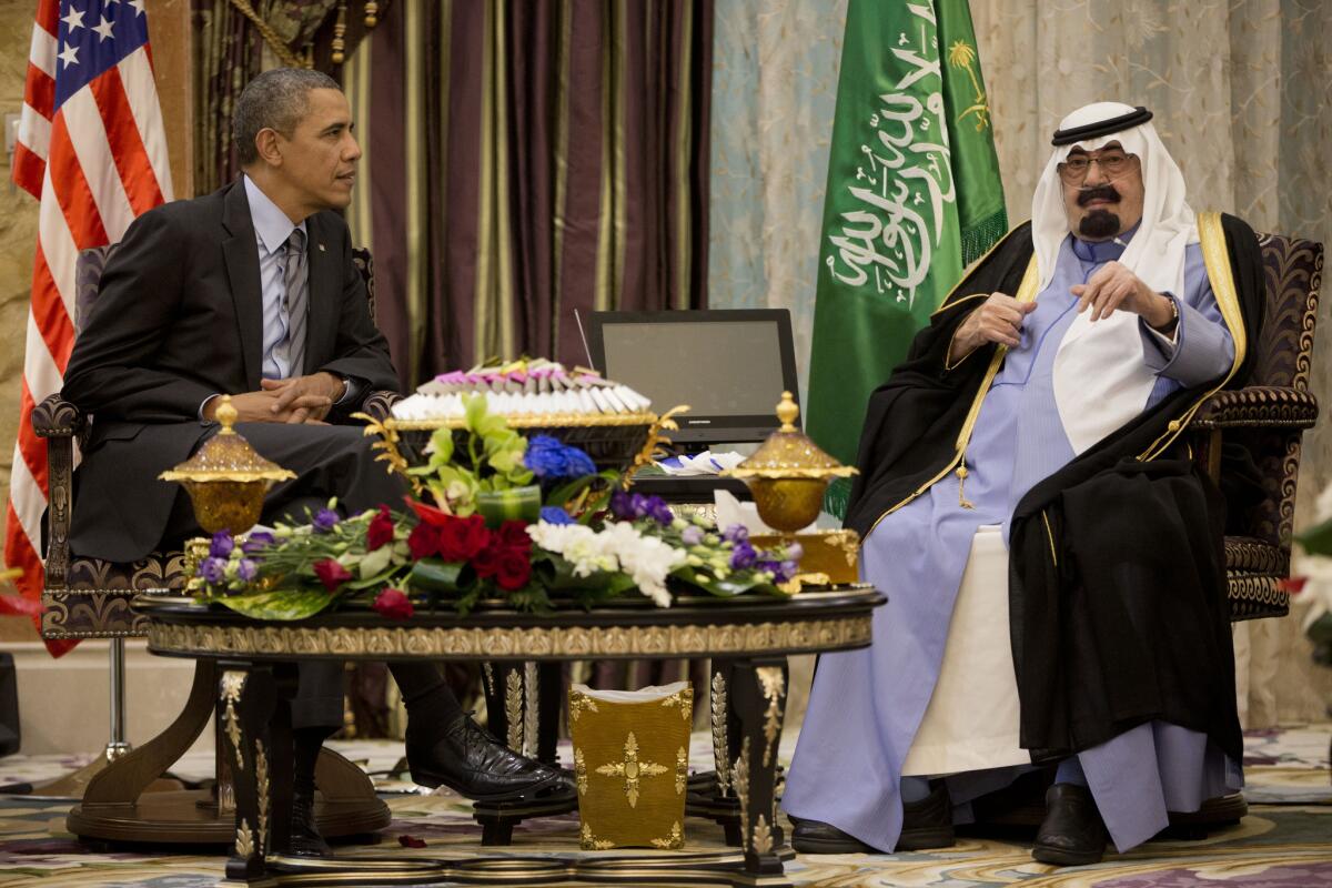 President Obama meets with Saudi King Abdullah in March about a coalition to tackle the Islamic State militant group at Rawdat Khuraim, Saudi Arabia.