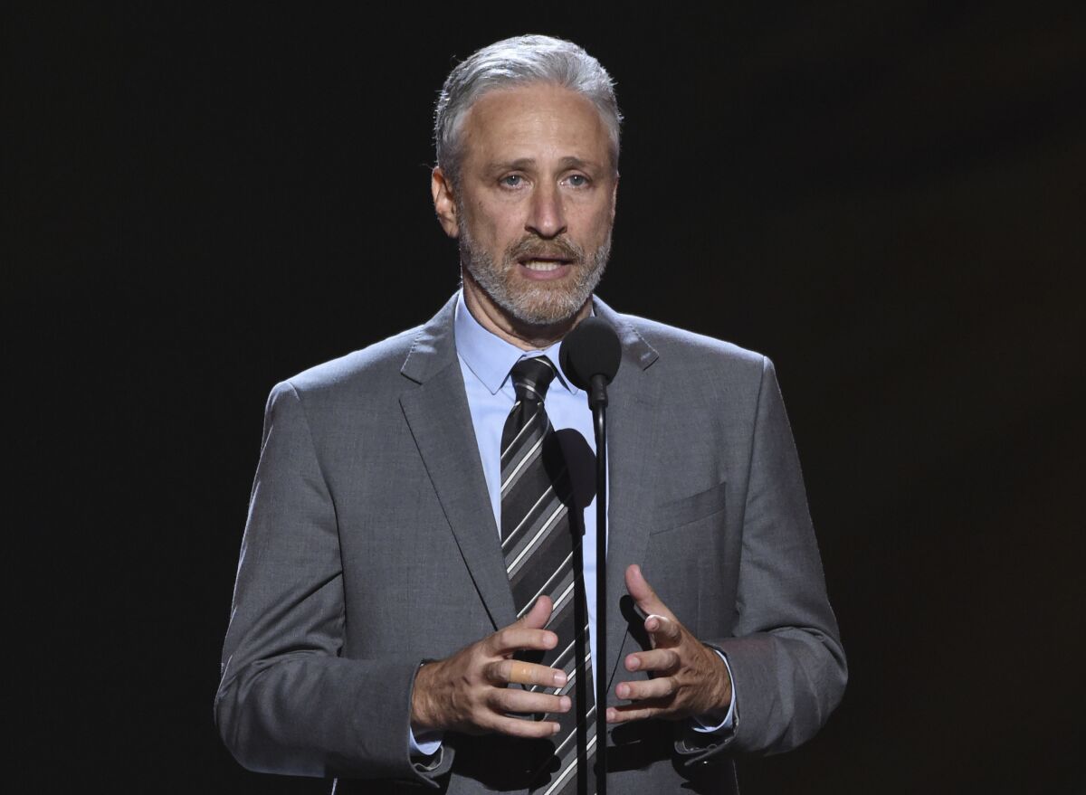 FILE- Jon Stewart presents the Pat Tillman award for service on July 18, 2018, at the ESPY Awards in Los Angeles. Stewart has been named the 23rd recipient of the Kennedy Center's Mark Twain Award for lifetime achievement in comedy. (Photo by Phil McCarten/Invision/AP, File)