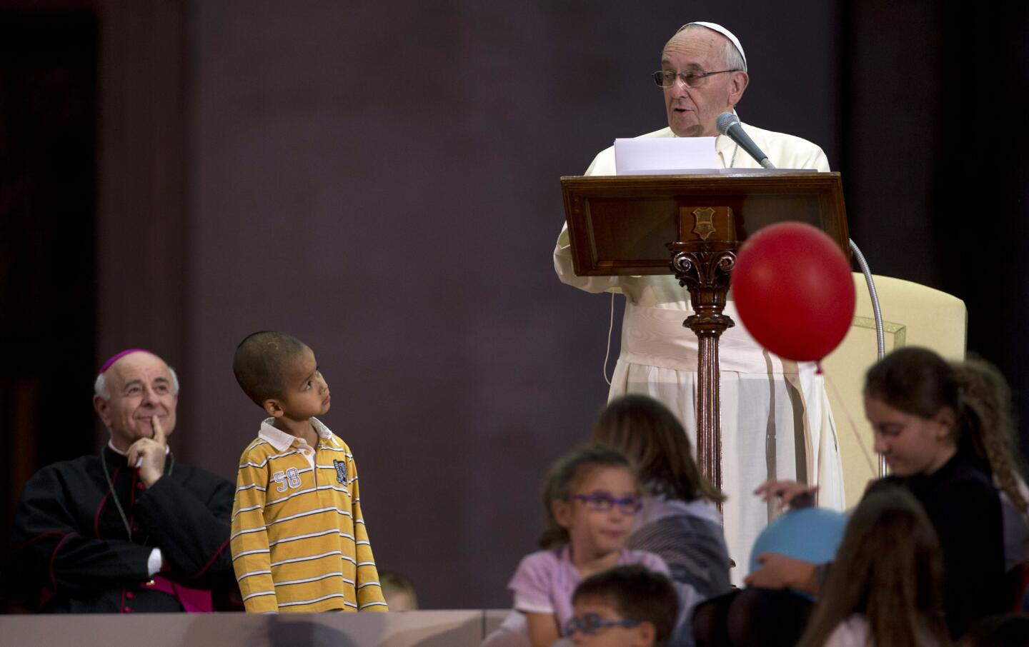 Boy joins Pope Francis onstage