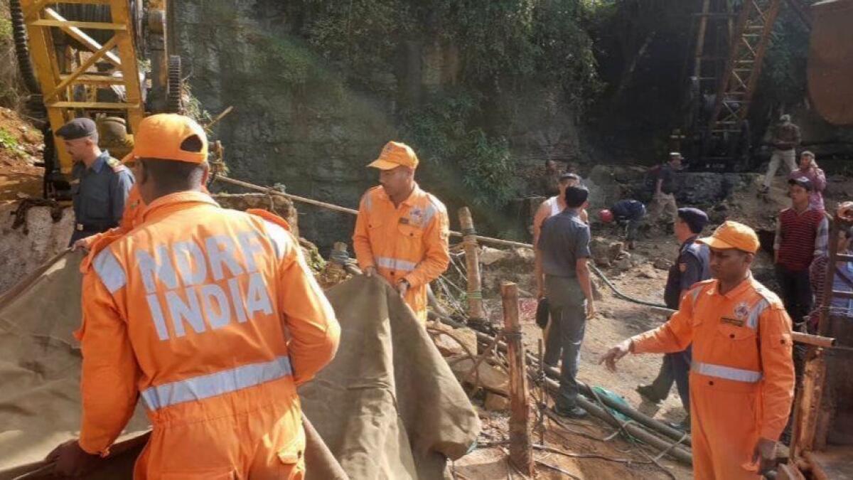 Rescuers work Dec. 14 at the site of a coal mine that collapsed in Ksan, in the northeastern Indian state of Meghalaya, trapping 15 young miners.