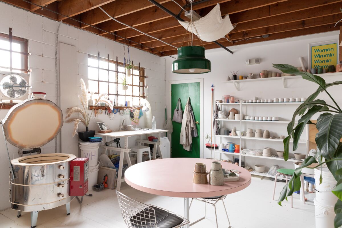 A photograph of ceramist Lindsey Hampton's Vancouver studio featured in the book "Creative Spaces."