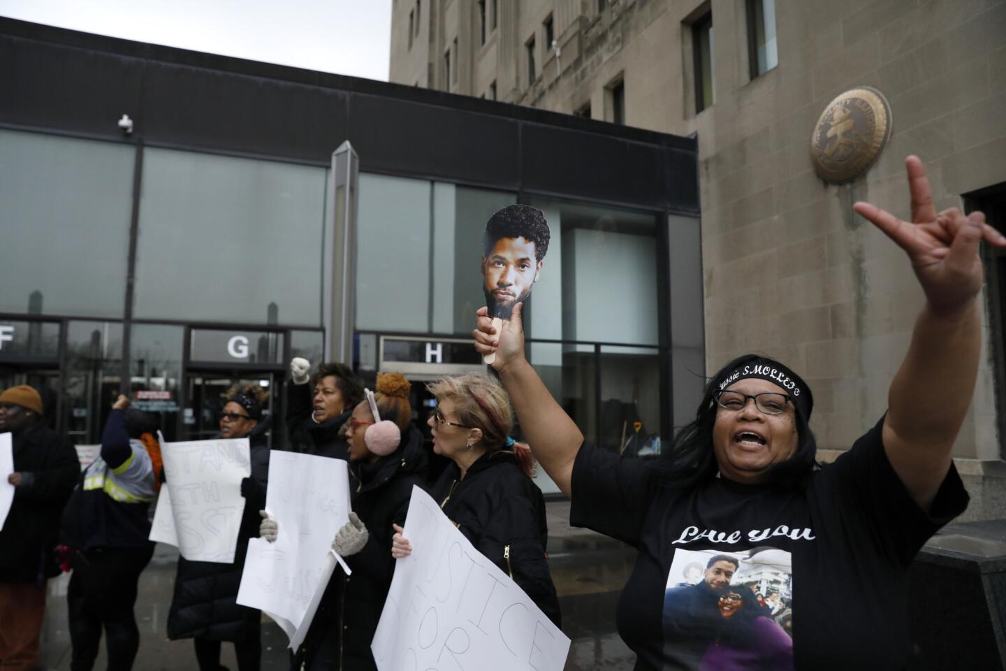 Jussie Smollett supporter Sandra Gentry, of Chicago, chants as Smollett arrives for a hearing at the Leighton Criminal Court Building in Chicago on March 14, 2019.