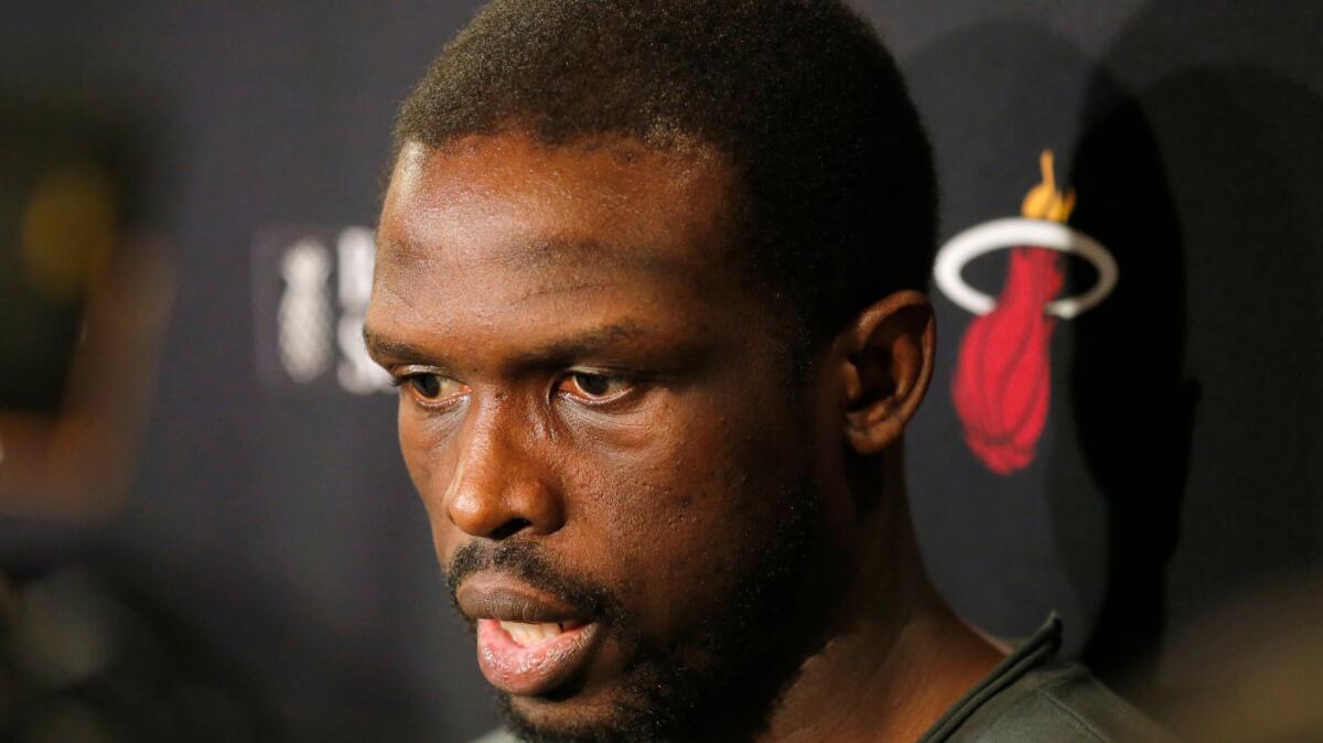 Miami Heat forward Luol Deng speaks to reporters Tuesday, May 17, 2016, in Miami.