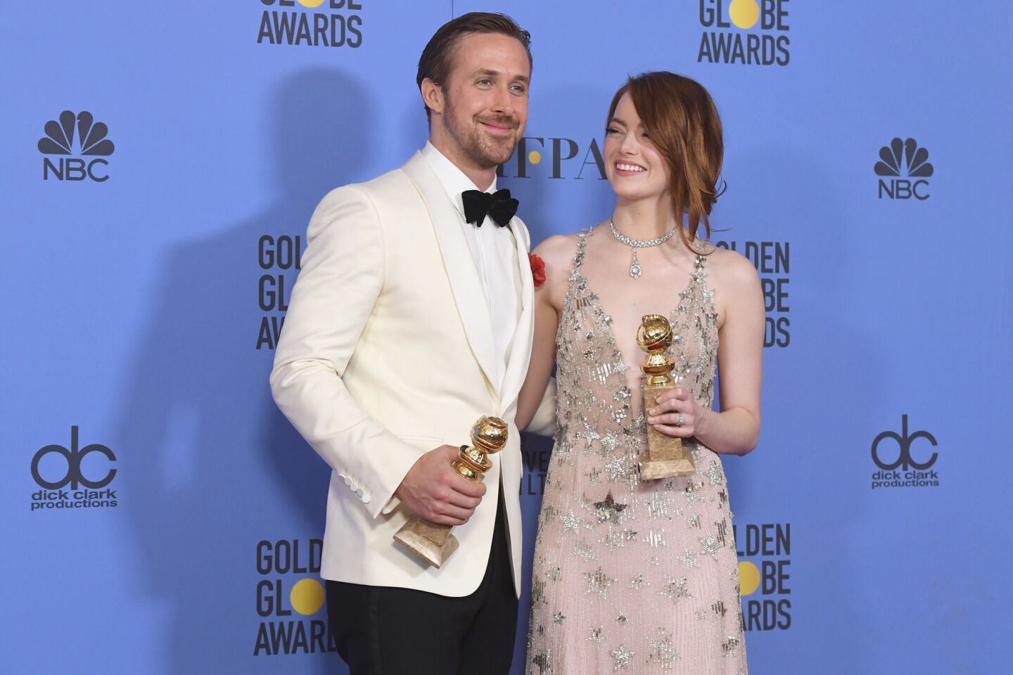 "La La Land" stars Ryan Gosling and Emma Stone, winners for actor and actress in a musical or comedy film.