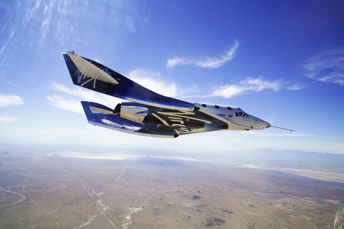 Virgin Galactic's space plane soars through the sky.