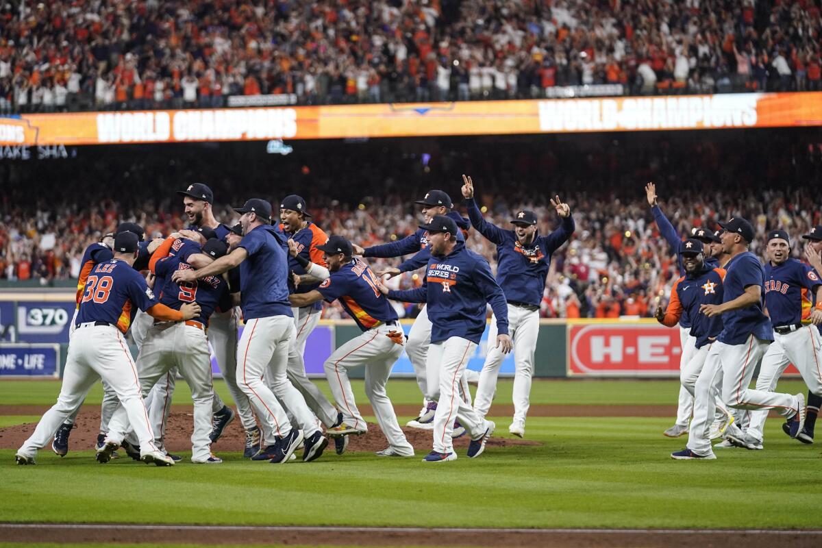 The Houston Astros celebrate immediately after their World Series-clinching win over the Philadelphia Phillies in Game 6.