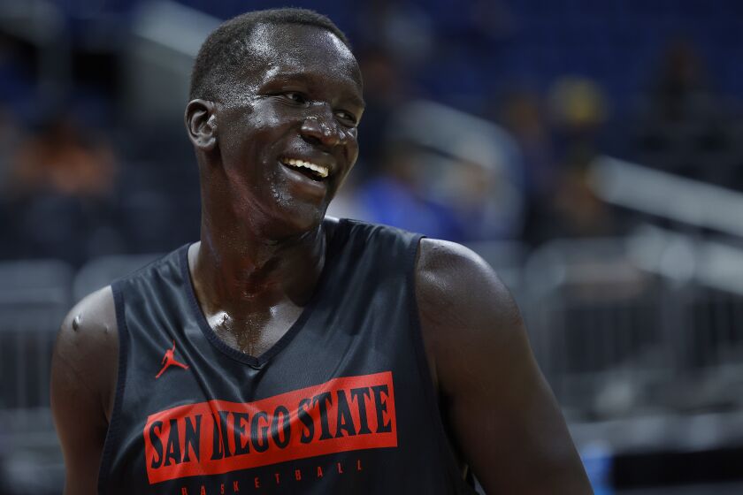 Orlando, FL - March 15: San Diego State's Aguek Arop looks on during a practice ahead of the Aztecs first round NCAA tournament game against the College of Charleston at the Amway Center in Orlando on Wednesday, March 15, 2023. (K.C. Alfred / The San Diego Union-Tribune)