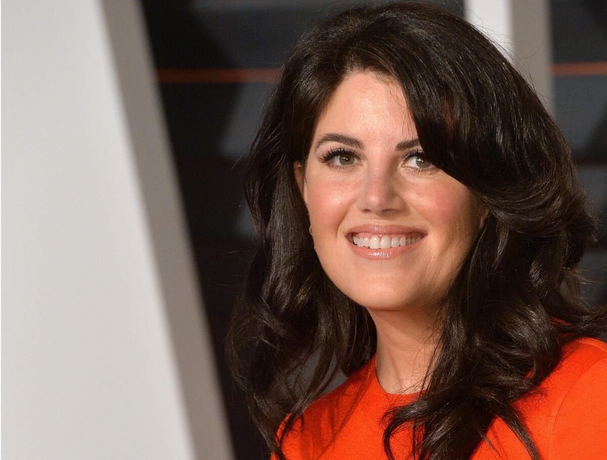 Monica Lewinsky arrives at the 2015 Vanity Fair Oscar Party at the Wallis Annenberg Center for the Performing Arts in Beverly Hills, Calif.