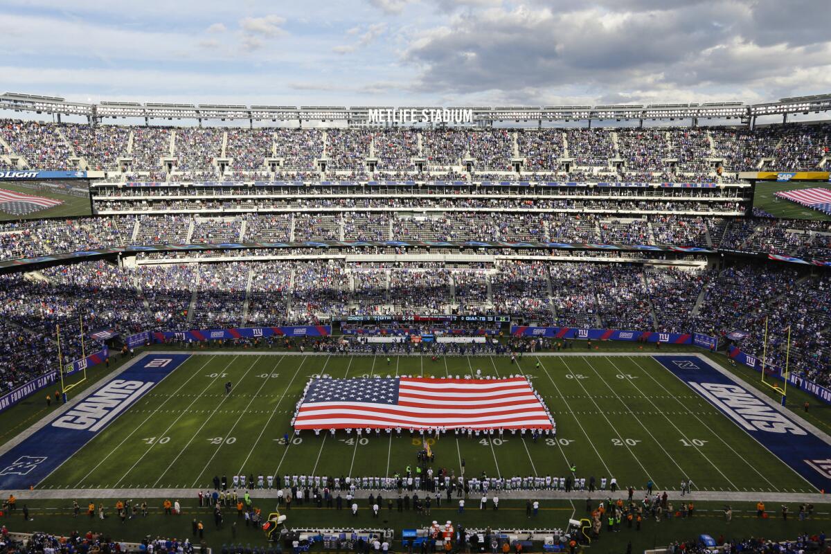 The national anthem is sung before an NFL game between the New York Giants and the Dallas Cowboys at MetLife Stadium on Oct. 25.